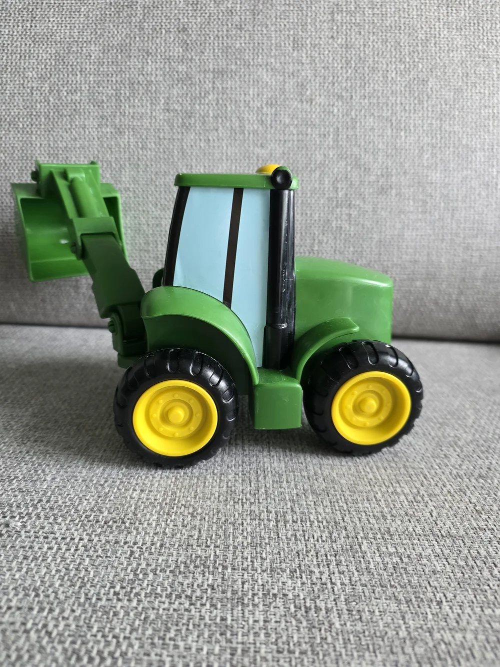 John Deere Green Smiling Excavator Toy with Black Wheels